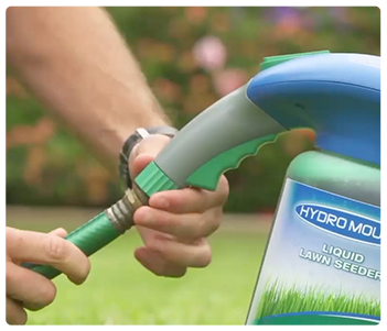 Woman mixing Liquid Lawn™